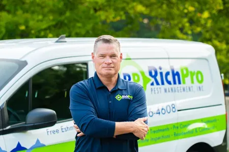 David Outhous, owner, standing in front of RichPro van